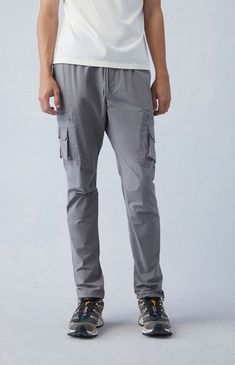 Casual meets cool with the new Eco Stretch Gray Slim Cargo Pants from PacSun. This go-to pair is designed with an elastic stretch waistline, adjustable drawstrings, side pockets, zip cargo pockets, a drawcord hem, and a slim fit.

Learn more about PacSun eco items Casual Nylon Bottoms With Elastic Waistband, Casual Travel Bottoms With Drawstring, Spring Travel Pants With Elastic Waistband, Utility Pants With Cargo Pockets For Travel, Utility Cargo Pants With Side Pockets For Travel, Casual Travel Pants With Pockets, Casual Cargo Pants With Side Pockets For Travel, Utility Bottoms With Pockets For Travel, Utility Travel Pants With Side Pockets