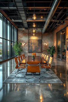 an empty conference room with brick walls and large windows