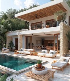 a house with a pool in front of it and some chairs around the pool area