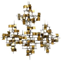 a sculpture made out of squares and rectangles is shown in the shape of a tree