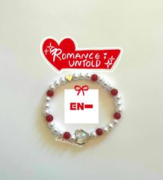 ˗ˏˋ ꒰ 💌 ꒱ ˎˊ˗ ENHYPEN "Romance; Untold" Inspired Elastic beaded bracelet ✿ 2.5 x 2.5 in (bracelet individual packaging) ✿ Elastic is stretchy but please don't attempt to break it </3 ✿ Made big enough to fit over bigger hands! ✿ Free shipping included ✿ Will include freebie Xo <33 Bead And Yarn Bracelet, Enhypen Inspired Bracelet, Enhypen Beads Bracelet, Enhypen Bracelet Ideas, Kpop Bead Bracelets, Enhypen Bracelet, Christmas Beaded Bracelets, Xo Bracelet, Xoxo Bracelet