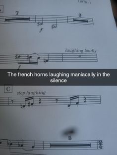 the french horns laughing mancially in the silentce are arranged on sheet music