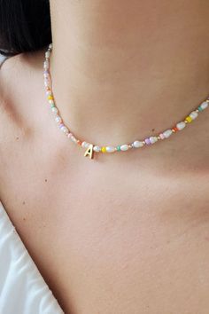 This delicate Pearl Initial Necklace is the most trendy, affordable and high-quality handmade piece you ever have. This personalized letter necklace is a great birthday gift, bridesmaid or mom gift option because it is so personal and dainty that everyone how got it will feel special ♡ Handmade Pearl Beaded Necklace For Gift, Personalized Dainty Pearl Necklace As Gift, White Pearl Necklace With Colorful Beads As Gift, Adjustable Colorful Beads Pearl Necklace As Gift, Cute Personalized Beaded Necklaces For Gift, Personalized Cute Beaded Necklace For Gift, Beaded Pearl Jewelry For Birthday, Personalized White Beaded Necklace For Gift, Personalized Pearl Necklaces As Gifts