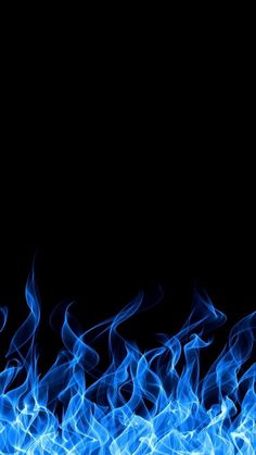 blue fire flames against a black background