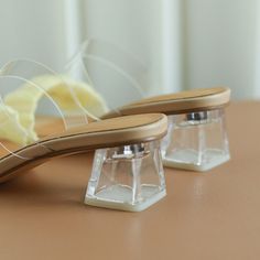 These clear heel sandals are perfect for a chic summer look. Upper: PVC + Silk Lining: Genuine Leather Outsole: TPR Toe Shape: Open Toe Closure: Slip-on Heel: 5.5cm/2'' is_handmade: Yes Trendy High Heel Jelly Sandals With Transparent Straps, Clear Open Toe Heels With Translucent Outsole, Trendy Clear Sandals With Transparent Straps, Clear Heels With Transparent Straps And Block Heel, High Heel Jelly Sandals With Clear Strap, Summer High Heel Shoes With Clear Strap, Trendy Clear Block Heel Sandals, Clear Open Heel Jelly Sandals For Summer, Clear High Heel Sandals For Summer