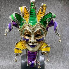 a mardi gras mask is on display