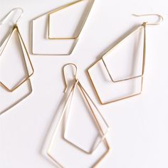 Chevron shapes, contrasting metals and a dangling design makes for subtle drama on these earrings. Earring length: 2.5 inches Available in sterling silver or 14k gold filled. Modern Teardrop Chandelier Earrings, Modern Geometric Gold Jewelry, Gold Geometric Earrings For Everyday, Geometric Gold Nickel-free Jewelry, Nickel-free Geometric Gold Jewelry, Gold Geometric Nickel-free Jewelry, Gold Geometric Jewelry With Matching Earrings, Geometric Accessories, Chevron Earrings