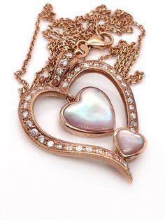 Gorgeous Love gift all-natural diamond and pink mother of pearl set in 18k solid rose gold heart pendant and linked chain necklace. Total weight: 7.8 grams Heart pendant size: 34*24 mm Chain length: 18 inches Total diamond weight: 0.46 tcw (stamped) Clarity: VS2 Color: G It comes in a nice gift box! Luxury Rose Gold Heart Necklace For Anniversary, Luxury Rose Gold Heart Necklace, Rose Gold Tarnish-resistant Heart Pendant Jewelry, Rose Gold Heart Pendant Jewelry With Diamond Cut, Luxury Heart-shaped Pearl Pendant Necklace, Mother's Day Heart-shaped Pearl Pendant Necklace, Luxury Heart-shaped Pearl Pendant, Gold Bar Pendant, Map Pendant