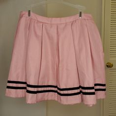 Pink Cheer Skirt With Black Stripe From Hot Topic Size: L New With Tags, Never Worn Pink Short Bottoms For School, Trendy Pink Skort For School, Pink School Skirt For Spring, Pink Short Length School Bottoms, Casual Pink Skort For School, Pink Skirt For Spring School Occasion, Pink Skirt For School In Spring, Pink Mini Skort For School, Pink Lined Flared Tennis Skirt