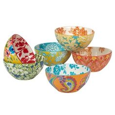 four colorful bowls are stacked on top of each other, with one bowl in the middle