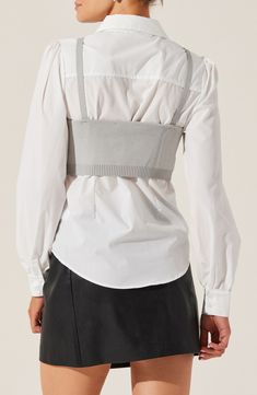 Effortlessly achieve an artfully layered aesthetic in this crisp poplin button-up refreshed with a bustier-inspired knit overlay for a date-ready reset. 24" length (size Medium) Bralette has sweetheart neck Shirt has front button closure, spread collar, long sleeves with two-button cuffs 100% polyester with 65% viscose, 35% nylon Dry clean Imported Fitted Button-up Top For Layering, Elegant Fitted Corset Belt For Workwear, Spring Chic Fitted Corset Belt, Chic Fitted Corset Belt For Spring, Elegant Tops With Built-in Bra For Workwear, Spring Cotton Corset Belt, Fitted Versatile Tops For Daywear, Trendy Fitted Corset Belt For Fall, Cotton Corset Belt For Spring