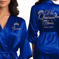 Step into your Quinceañera celebration in style with our Personalized Satin Quinceañera Robe. Crafted for your special day, this personalized Quinceañera robe exudes luxury and elegance. Ideal for getting ready moments and capturing unforgettable photos, it features beautiful glitter and regular text color options to match your Quinceañera party. Perfect for your Quince birthday, our personalized robe is a symbol of sophistication and grace as you embark on this milestone journey. Make your Mis Royal Blue Robe, Royal Blue And Silver Quince Theme, Royal Blue Quinceanera Theme Ideas, Quince Royal Blue, Dark Blue Quince, Quince Robe, Gold Dama Dresses, Navy Blue Quinceanera Ideas, Quinceañera Gifts