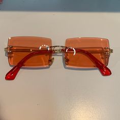 Brand New & Never Worn! Comes With Case! Red Rimless Sunglasses For Party, Retro Red Sunglasses For Summer, Red Retro Sunglasses For Summer, Red Sunglasses With Gradient Lenses For Spring, Orange Glass Sunglasses For Spring, Red Glass Sunglasses For Summer, Trendy Red Rimless Sunglasses, Chic Red Sunglasses For Spring, Red Rimless Sunglasses For Summer