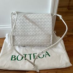 This Is 100 % Authentic Bought It Last Summer In Italy (Never Used) Need The Cash!! Intrecciato Large Knot Shoulder Bag Description Bottega Veneta Shoulder Bag White Leather Intrecciato Weave Single Shoulder Strap Leather Lining Open Top Includes Dust Bag White Intrecciato Weave Bag For Travel, White Intrecciato Weave Travel Bag, Luxury White Shoulder Bag With Intrecciato Weave, Timeless White Crossbody Shoulder Bag, Luxury White Intrecciato Weave Shoulder Bag, White Rectangular Bag With Intrecciato Weave, Designer White Bags With Intrecciato Weave, White Shoulder Bag With Intrecciato Weave For Travel, Classic Intrecciato Shoulder Bag For Shopping