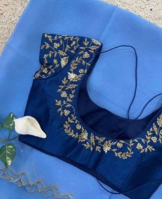 Hand embroidered ready made saree blouse with saree /blue crop top/stitched saree blouse usa /orgajza  saree blouse/modern blouse/zardosi blouse/blue organza saree blouse/ pure silk blouse/ silk saree with maggam work blouse        It is very true that a perfect blouse is the one which makes your saree look stand out !! If you find one of such a style that you have been wanting to have then dont let it go !! we carry such unique trending blouses that instantly add a stylish look to any saree !!     Well..!! we understand that you may not get in your desired size/pattern, here you go with customization according to your size/pattern which we can deliver in 1-2 weeks of time period !!      Here is a beautiful Hand embroidered zardosi work saree  in ice blue color that has golden shade cutwor Blue Tissue Silk Blouse Piece For Party, Floral Embroidered Organza Saree Blouse, Blue Fitted Tissue Silk Pre-draped Saree, Blue Fitted Pre-draped Tissue Silk Saree, Organza Blouse With Floral Embroidery For Festivals, Traditional Blue Pre-draped Saree With Floral Embroidery, Fitted Blue Tissue Silk Choli, Blue Organza Unstitched Blouse Piece, Blue Pre-draped Saree With Unstitched Blouse In Tissue Silk