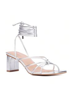 These exotic strappy heeled sandals are a go-to for many in the fashion crowd. The multi-wrap ankle strap and stacked kitten heel finish the style.

• Upper: 100% Faux Leather
• Outsole: 100% Rubber
• Lining: 100% Faux Leather
• Heel Height: 2.38"Fashion To Figure Women's Lana Strappy Heel Sandal - WIDE WIDTH Metallic Silver         Wide Fit Shoes, size features are:Bust: ,Length: ,Sleeve Length: Adjustable Strappy Heels With Wrapped Heel, Strappy Lace-up Sandals With Stacked Heel, Summer Strappy Lace-up Sandals With Heel Loop, Spring Ankle Wrap Sandals With Heel Loop, Adjustable 4-inch Heel Summer Sandals, Spring Sandals With Wrapped Heel And Adjustable Fit, Trendy Adjustable Strappy Heels, Adjustable Sandals With 4-inch Heel For Spring, Adjustable Low Heel Lace-up Sandals For Party