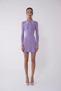 She's back and in a brand new color: the lurex mini polo dress, donning our signature, oversized, pointed collar, fit 'n flare shape, and ribbed stitch, now available in a soft violet. Isn't she perfect for your most flirtiest of soirees? Also available in Honeydew and Pink. Content: 75% viscose, 8% metal, 20% lycra. Model is 5' 9,5" and wearing size XS. View our size chart, shipping, and returns policy here. Chic Fitted Mini Dress With Collared Neckline, Spring Mini Dress With Fitted Collared Neckline, Spring Mini Dress With Collared Neckline And Fitted Design, Fitted Party Dress With Collared Neckline, Fitted Collared Shirt Dress For Winter, Winter Collared Fitted Shirt Dress, Chic Fitted Polo Dress For Spring, Fitted Mini Polo Dress For Spring, Collared Fitted Mini Dress For Winter