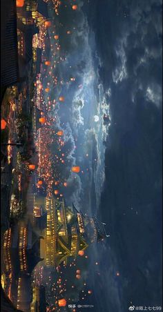 an aerial view of a city at night with fireworks in the sky and buildings lit up