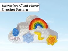 there is a crochet pattern for a cloud with rainbows and stars on it