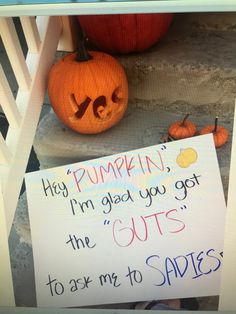 a pumpkin sitting next to a sign that says, hey pumpkin i'm glad you got the guts to ask my to spades