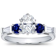 This engagement setting is set with two baguettes and two 3.2mm sapphire gemstones. This setting is available in white or yellow gold and platinum. Round Diamond Setting, Engagement Sets, Diamond Settings, Sapphire Gemstone, Round Diamond, Round Diamonds, Platinum, Sapphire, White Gold