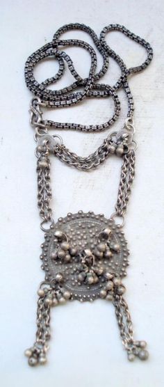 Vintage Antique collectable tribal old silver necklace pendant from Rajasthan India. Great workmanship, Original old worn piece, Good for jewellery collection. Length - 68.6 cm (27") we can adjust the length. Weight - 63 grams  Material - silver and original old worn piece. Antique Silver Necklaces For Rituals, Heavy Antique Silver Necklace, Antique Silver Necklace For Rituals, Silver Locket Necklace For Festival, Bohemian Locket Necklace For Ceremonial Use, Bohemian Locket Necklace For Ceremonial Occasions, Silver Necklace Chain, Silver Necklace Pendant, Rajasthan India