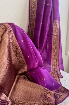 🌸Fabric-  Kora silk(Orgenza Silk) 🌸Color -Purple  🌸Work-saree hain all over antique zari buti  and  rich border and palla.🌸saree comes with unstinted  blouse piece.. 🌸saree is done with fall pico and tassels  🌸saree length is 5.5 meters  Note:   please contact me if you have any questions regarding the product 🙏🏻 Purple Traditional Wear For Ceremonial Eid, Purple Traditional Wear For Eid Ceremonies, Purple Raw Silk Traditional Wear With Zari Work, Ceremonial Purple Saree With Traditional Patterns, Festive Purple Raw Silk Traditional Wear, Purple Ceremonial Dupatta For Festivals, Purple Traditional Wear For Ceremonial Festive Occasions, Purple Raw Silk Saree With Pallu, Purple Chanderi Traditional Wear With Zari Work