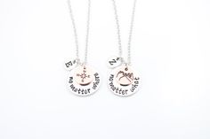 "Two stylish minimalist necklaces with compass and pinky promise copper charms feature personalized initials, which makes them perfect gifts for best friends. Tell your bestie you'll cherish your friendship no matter where or what. The necklace length is 46cm / 18.1\". Material: silver-plated zinc alloy. The item is packed in a recycled plastic pink opp bag (the Christmas theme is red) and ready to give away as a gift. Click here for Upgrades and Add On: https://etsy.me/3QDqK7w The item is personalized. Please let me know if you wish to change the places of the charms, add more or remove any. Please send me a message for customization. Minimalist style jewelry directly from Sweden. We have something special for you, your family and your friends. We are always happy to create unique jewelry Best Friend Gift Pendant Charm Necklace, Adjustable Pendant Charm Necklace For Best Friend, Personalized Rose Gold Jewelry For Friendship, Adjustable Rose Gold Necklace For Friendship, Personalized Adjustable Charm Necklace For Best Friend, Personalized Adjustable Charm Necklaces For Best Friend Gift, Personalized Jewelry For Best Friend Gift, Meaningful Stainless Steel Jewelry For Best Friend, Stainless Steel Jewelry For Best Friend Gift