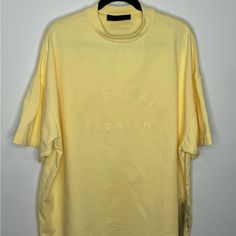 Fear Of God Essentials Heavy Jersey Crewneck T-Shirt Oversized Yellow Men’s Small. Nwt. Spring Streetwear Drop Shoulder Tops, Urban Oversized Short Sleeve Tops, Urban Style Oversized Short Sleeve Tops, Oversized Short Sleeve Top For Streetwear, Urban Drop Shoulder Tops For Spring, Urban Drop Shoulder Spring Tops, Urban Spring Drop Shoulder Tops, Spring Urban Drop Shoulder Tops, Oversized Yellow Top For Streetwear