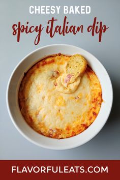 cheesy baked spicy italian dip recipe in a white bowl with text overlay