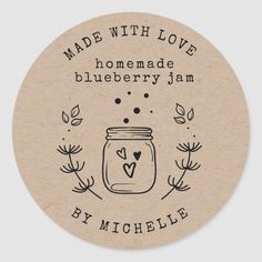 a round sticker that says made with love, homemade blueberry jam