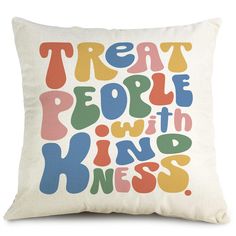 a pillow with the words treat people with kinds printed on it, in multi - colored letters