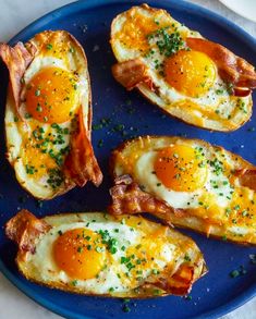 baked breakfast potatoes on a blue plate with text overlay that reads make best foody roast breakfast potatoes twice