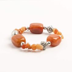 "Find the John Bead Peach Aventurine & Silver Filigree Bead Stretch Bracelet at Michaels. com. This handmade bead bracelet, made using peach aventurine beads in a mix of shapes interspersed with filigree silver-colored beads, will make a fantastic addition to your accessory collection. This handmade bead bracelet, made using peach aventurine beads in a mix of shapes interspersed with filigree silver-colored beads, will make a fantastic addition to your accessory collection. Peach aventurine is a Adjustable Orange Gemstone Bead Bracelet, Bohemian Aventurine Gemstone Beads Bracelets, Bohemian Beaded Aventurine Bracelets, Adjustable Orange Beaded Bracelets With Natural Stones, Adjustable Orange Natural Stone Beaded Bracelets, Beaded Aventurine Bracelet, Bohemian Aventurine Beaded Bracelets, Aventurine Beaded Bracelet, Bohemian Carnelian Bracelet In Orange