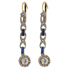 Art Deco style hanging gold earrings with diamonds and sapphires. Art Deco period hanging earrings with diamonds in old diamond and rose cuts with a total weight of over 0,55ct. Unique earrings additionally set with carre cut sapphires. Earrings made of 18-karat yellow gold and platinum elements. Origin: Western Europe, 1920s. Length: 3.7cm Weight: 3.68g. Elegant earrings will certainly appeal to fans and connoisseurs of the Art Deco style. Hanging Gold Earrings, Luxury Art Deco Earrings With Brilliant Cut, Luxury Art Deco Earrings With Diamond Accents, Formal Art Deco Clip-on Earrings, Clip-on Art Deco Earrings For Evening, Art Deco Multi-stone Sapphire Jewelry, Stile Art, Deco Earrings, Estilo Art Deco