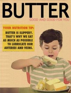 a child eating butter on top of a plate