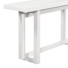 a white table with two legs and a shelf on the top that is attached to it