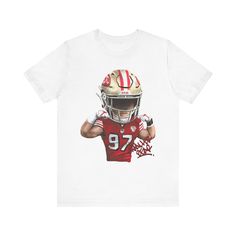 Show your love for the San Francisco 49ers with this one-of-a-kind t-shirt featuring an exclusive illustration of your favorite player! Nick Bosa's force is captured in this design, making it a must-have for any devoted 49ers fan. Whether you're cheering from the stands or watching from home, this shirt lets you represent your team in style. Grab yours now and stand out on game day! This classic unisex jersey short sleeve tee fits like a well-loved favorite. Soft cotton and quality print make users fall in love with it over and over again. These t-shirts have-ribbed knit collars to bolster shaping. The shoulders have taping for better fit over time. Dual side seams hold the garment's shape for longer.  .: 100% Airlume combed and ringspun cotton (fiber content may vary for different colors) Fan Apparel Tops With Character Print For Sports Events, Sports Fan Apparel Tops With Character Print, Crew Neck T-shirt With Character Print For Sports Events, Nick Bosa, 49ers Fans, San Francisco 49ers, Jersey Shorts, Game Day, Cotton Fiber