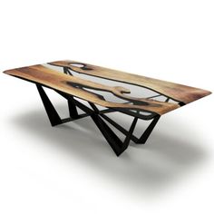 a wooden table with an artistic design on it