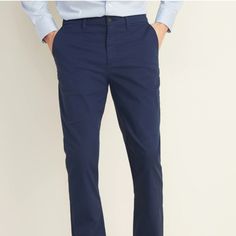 I Have Listed A Pair Of Old Navy Slim Ultimate Built-In Flex Chino Pants For Men They Are Navy Blue Size 34x32 Materials & Care 61% Cotton, 37% Polyester, 2% Spandex Machine Wash Cold, Tumble Dry Low. Imported. Fit & Sizing Our Best-Selling Fit. Sits At Waist. Slim Through Hip And Thigh. As Shown I Ship Daily Monday Thru Friday All My Items Come From My Smoke & Cat Free Home I Am More Than Happy To Answer Any Questions You May Have. Thank You For Looking! Happy Poshing! Blue Slim Fit Pants With Pockets, Business Casual Blue Pants With Pockets, Blue Business Casual Pants With Pockets, Blue Pants With Pockets For Business Casual, Blue Slim Fit Casual Pants, Casual Slim Fit Blue Bottoms, Blue Tapered Leg Business Casual Work Pants, Blue Tapered Leg Work Pants For Business Casual, Blue Slim Fit Casual Dress Pants