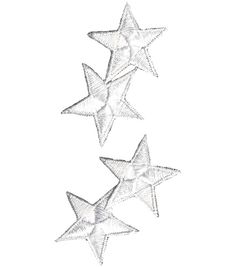 three white stars hanging from the ceiling