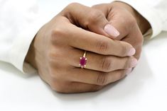 This ring features a beautiful faceted Ruby gemstone set in a delicate prong setting ring. ✑ Add a perfect engraving HERE - https://www.etsy.com/listing/562403746 ☛ Ring size - select your size in the drop down menu => Gemstone Type - Ruby (Treated) => Gemstone Size - 7x11mm => Gemstone Cut - Oval => Metal Type - 14k Gold Filled ► Nickel Free ✔ ► Tarnish Resistant ✔ ► One Year Warranty ✔ ► 30 days return policy ✔ ❏ Replacements and custom orders : ✪ Over 50 other gemstones available Gold Ruby Wedding Ring With Center Stone, Gold Ruby Ring Round Cut For Promise, Gold Ruby Ring For Promise Occasion, Yellow Gold Ruby Jewelry For Promise, Dainty Gold Ruby Ring For Promise, Minimalist Gold Solitaire Ruby Ring, Yellow Gold Solitaire Ruby Ring For Promise, Minimalist Gold Ruby Ring, Oval Gold Jewelry With Lab-created Ruby