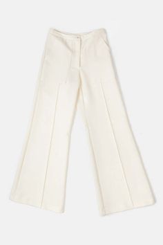 The darby is our best-selling high-waisted flared stretch pant with front patch pockets and a pintuck stitched down front of each leg. with a subtle 70's svelte silhouette darby fits the figure beautifully. cut in a beautifully structured yet lightweight wool gabardine.    pairs perfectly with slouchy sweaters fitted blazers or a simple tee or silk camisole.    shown with the baudelaire coat in winter white    erica tanov    details    made in usa. 100% wool. dry clean only. Easy Tiger, Slouchy Sweater, Black Crane, Sweater Fits, Silk Camisole, Blue Flats, High Waisted Flares, Simple Tees, Fitted Blazer