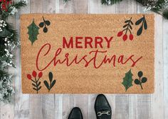 Deck your doorstep with this festive Merry Christmas Coir Doormat! Handmade and ready to bring festive cheer to any porch, this holiday doormat features script Merry Christmas text in red and holiday greenery and comes in three sizes perfect for any entryway Diy Rug Painting, Holiday Doormat, Door Mat Diy, Merry Christmas Text, Fall Doormat, Holiday Greenery, Halloween Door Mat, Christmas Text, Christmas Doormat