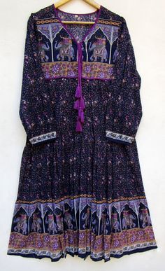 "ITEM DESCRIPTION rayon crepe printed long women's maxi dress | long sleeve with tassel dress | v neckline dress Features : Long sleeve, V neck, Long dress Material : rayon crepe Fabric: 100% rayon soft light weight ethnic print fabrics Sleeve Length = 22 inch For more sizes & their measurement, please refer our below chart to understand the sizes variations available with us For your size requirement, please mention your size in seller note at the time of buying. SIZE MEASUREMENT BUSTLENGTH V Neck Long Dress, V Neckline Dress, Maxi Dress Long Sleeve, Long Summer Dresses Maxi, Cotton Voile Fabric, Tie Maxi Dress, Maxi Dress Long, Tassel Dress, Bohemian Maxi Dress