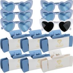 blue heart shaped sunglasses with white frames and matching case