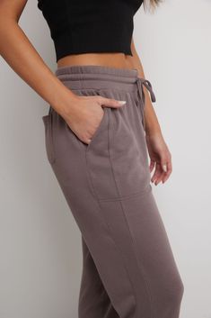 A part of our Simply Soft collection, this sporty-chic jogger is a charming choice to wear to work, weekend, and wherever else your life will carry you! These are a mid-rise fit, designed with a snug, elastic waistband and drawstring to adjust them to your desired comfort. You’ll fawn over these for many reasons, and their practicality may top that list: front and back pockets give you a little extra storage room for keys and other essentials. Their tapered leg is capped off with a soft self-cuf Bolero Cardigan, Bolero Dress, Fashion Joggers, Sporty Chic, Slim Waist, Loungewear Shorts, Denim Pant, Soft Knits, Jogger Pants