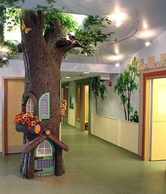 a tree house in the middle of a hallway