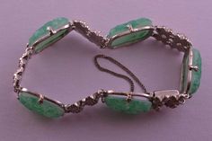 A choice Art Deco 1920's bracelet. Chrome, marcasite and peking glass. Condition: Very GoodDimensions: 180mm x 13.5mm Art Deco Jade Jewelry For Formal Occasions, Formal Art Deco Jade Jewelry, Art Deco Carved Round Jewelry, Chrome Art, Italian Bracelet, Art Deco 1920s, Art Deco Bracelet, Vintage Elephant, Elephant Charm