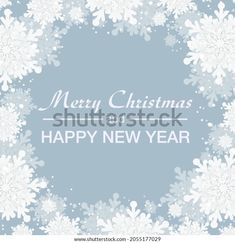 merry christmas and happy new year greeting card with white snowflakes on blue background